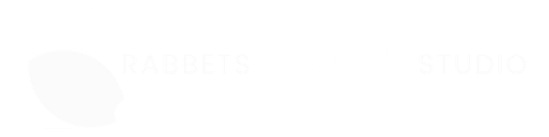 Rabbets Creative Studio - BW Digital Logo for Rabbets Creative Studio with a white abstract rabbit on the left and the words 'RABBETS Creative STUDIO' in white across the image.